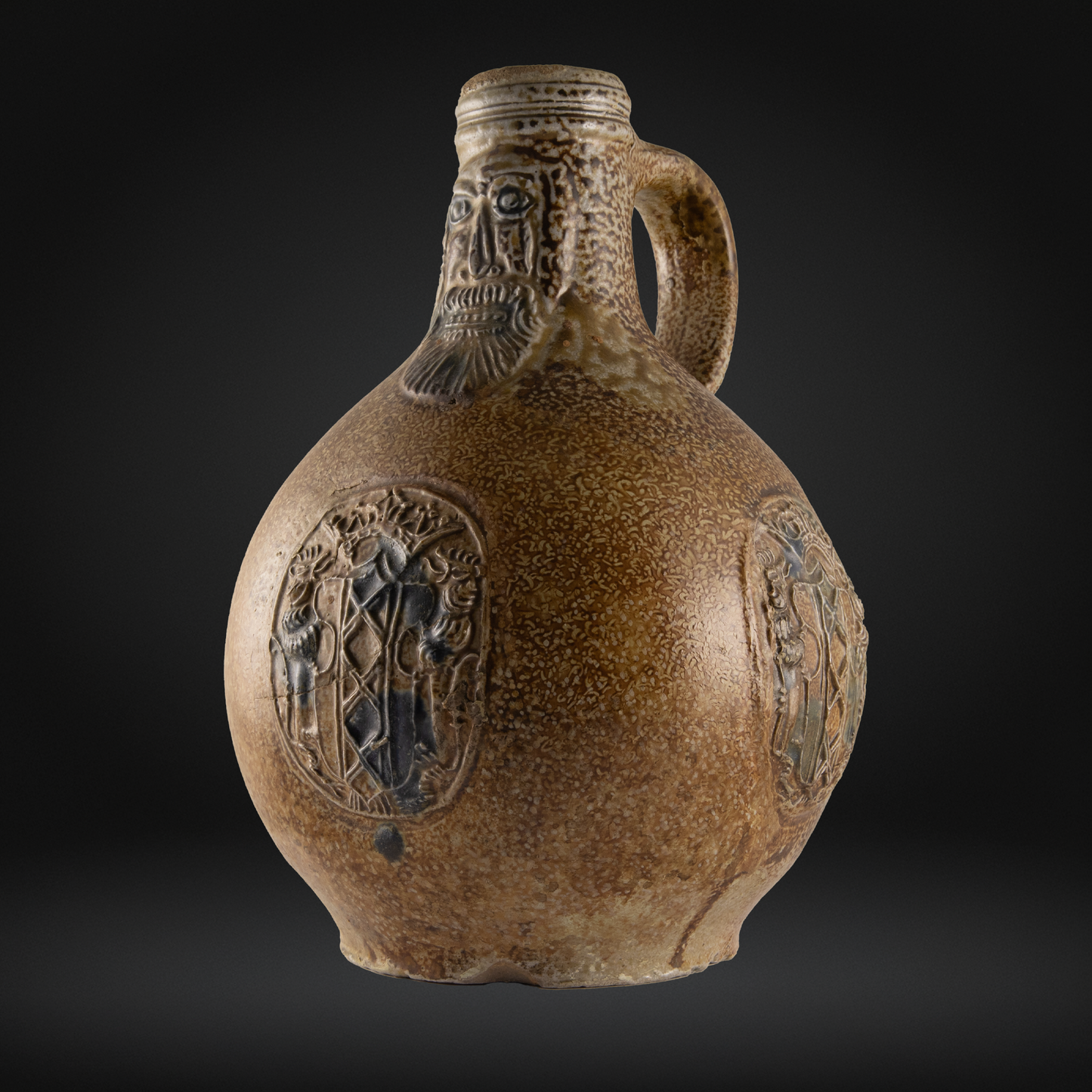 Cobalt Splashed Bellarmine Bottle, 3 Medallion, Amsterdam Coat of Arms 16th / 17th Century, antique ceramic stoneware jug with bearded face and detailed embossed medallions.