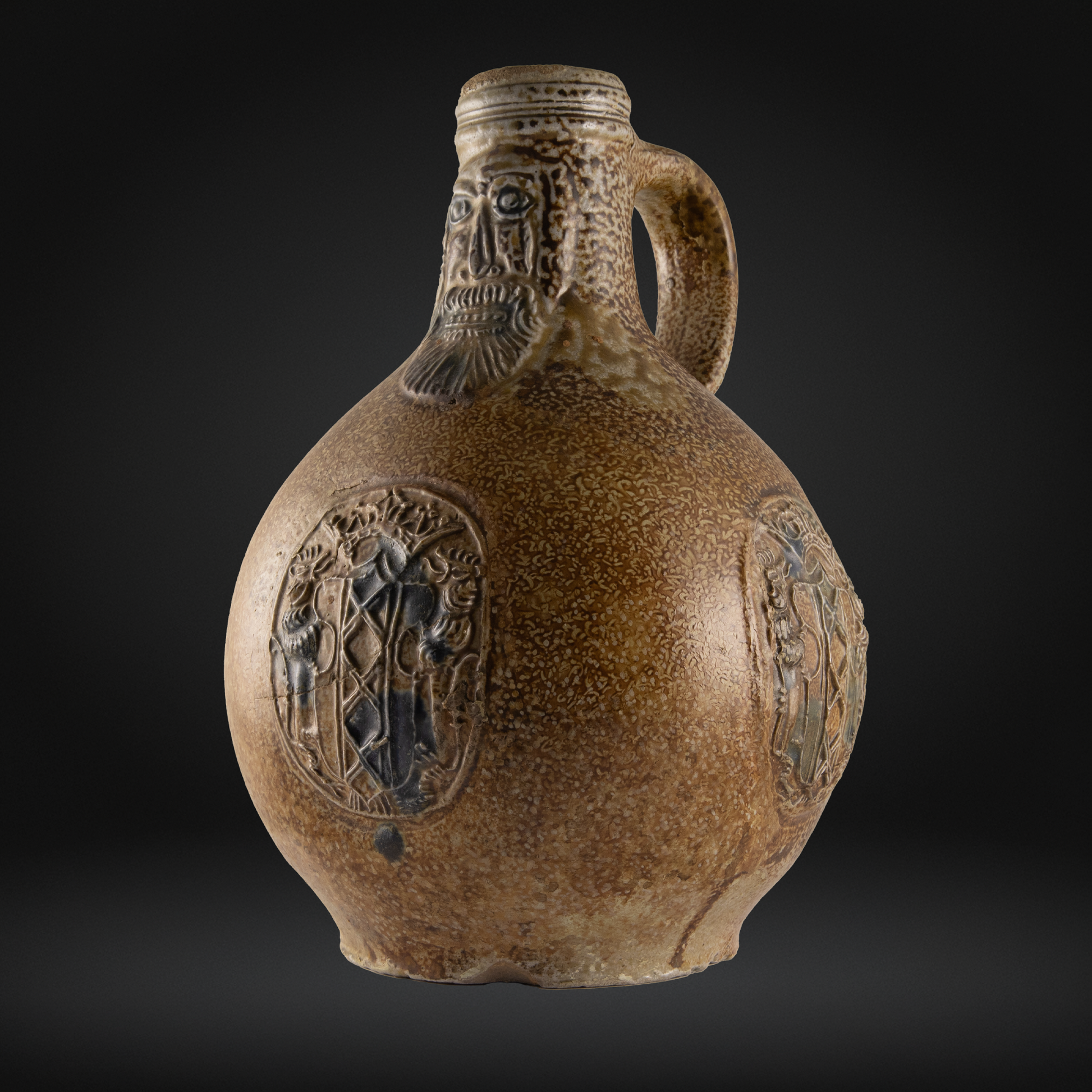 Cobalt Splashed Bellarmine Bottle, 3 Medallion, Amsterdam Coat of Arms 16th / 17th Century, antique ceramic stoneware jug with bearded face and detailed embossed medallions.