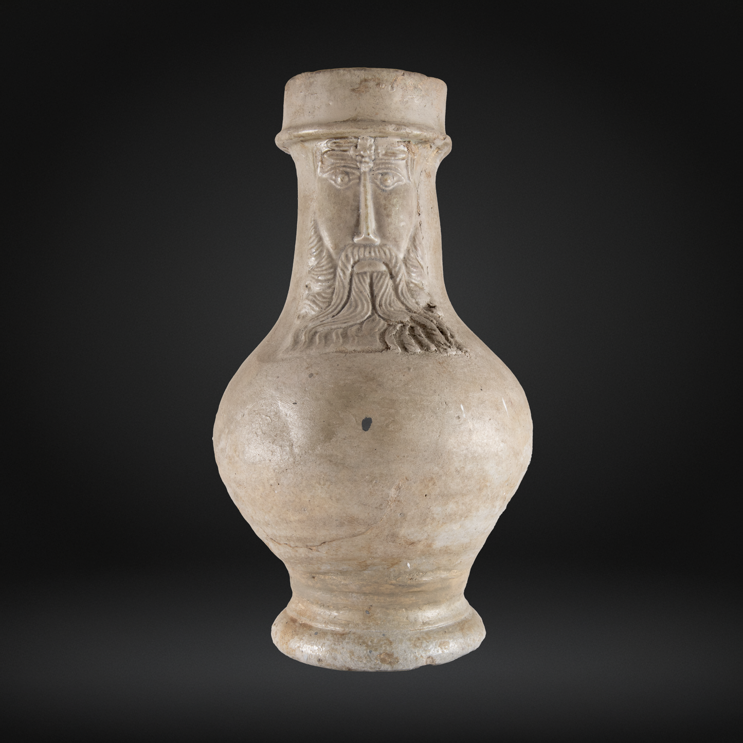 16th Century Raeren Salt Glaze Stoneware Bellarmine Jug with a bearded face design, showcasing antique German stoneware craftsmanship and medieval bellarmine bottle style.