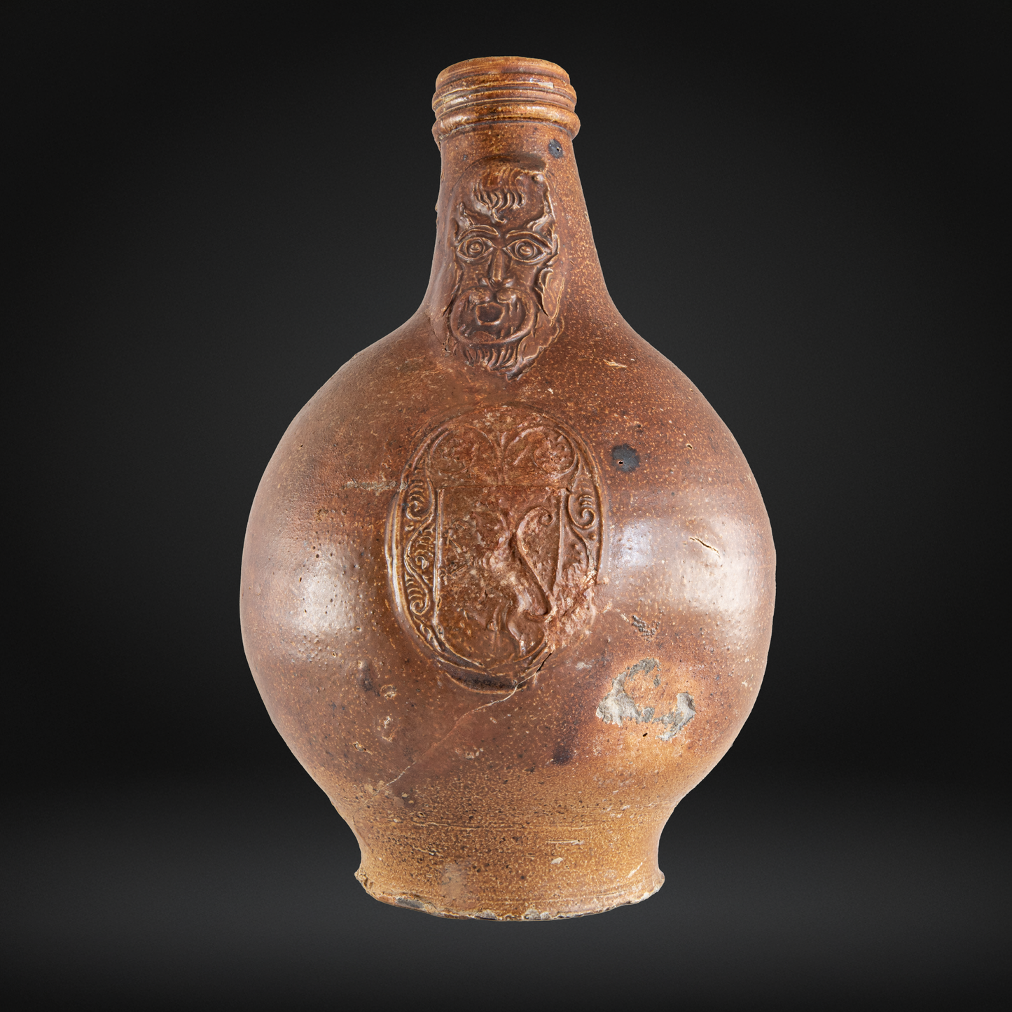Rare Devil's Mask Bellarmine Bottle, Rampant Lion - 17th Century, Frechen