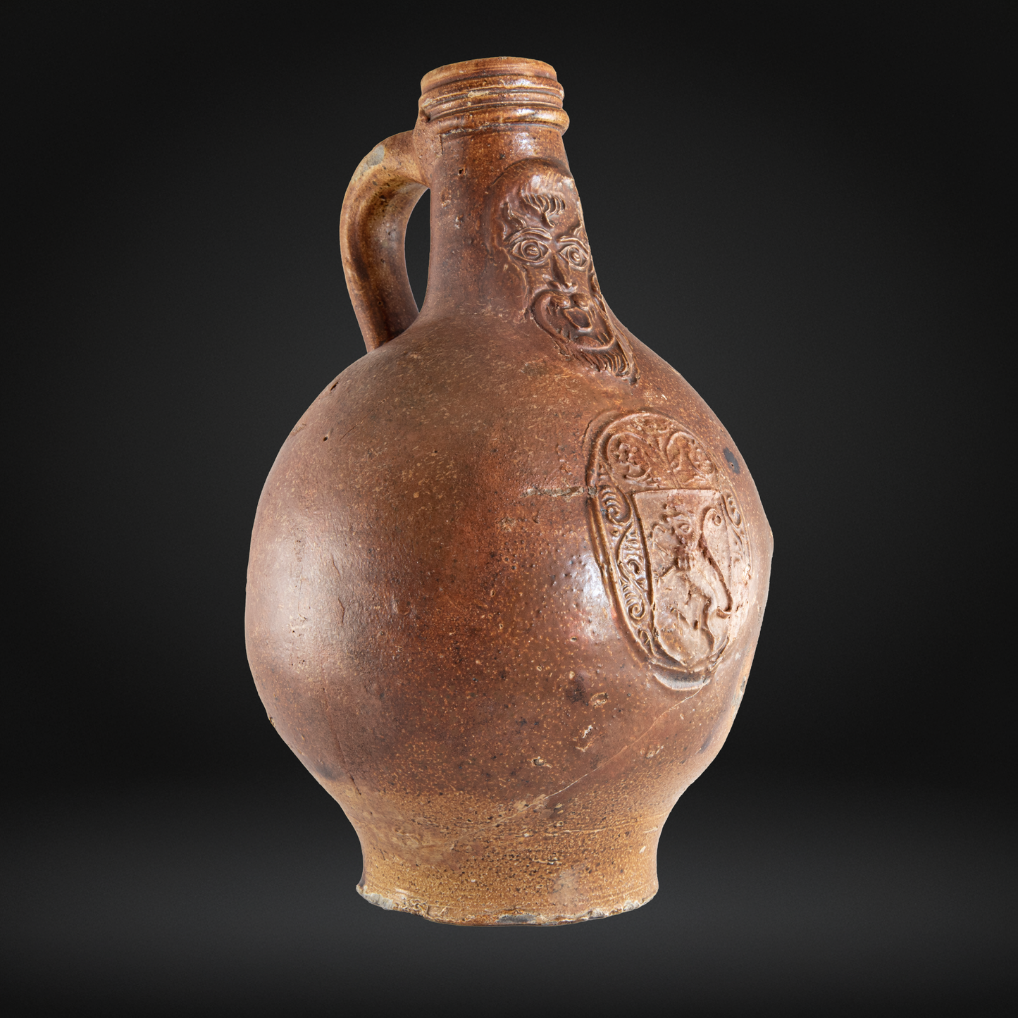 Rare Devil's Mask Bellarmine Bottle, Rampant Lion - 17th Century, Frechen