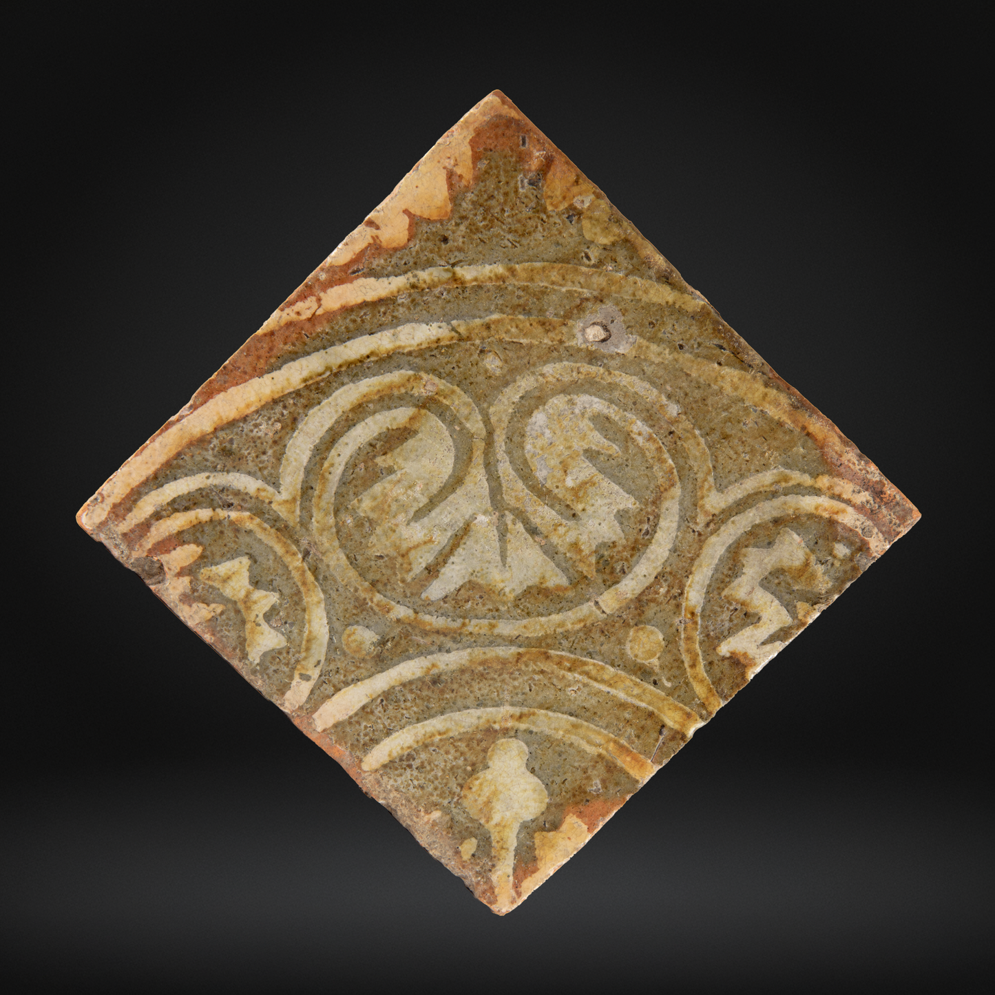 Medieval Encaustic Quatrefoil Floor Tile - 14th Century, Northern France with intricate symmetrical patterns in muted earth tones, showcasing historical medieval encaustic tile craftsmanship.