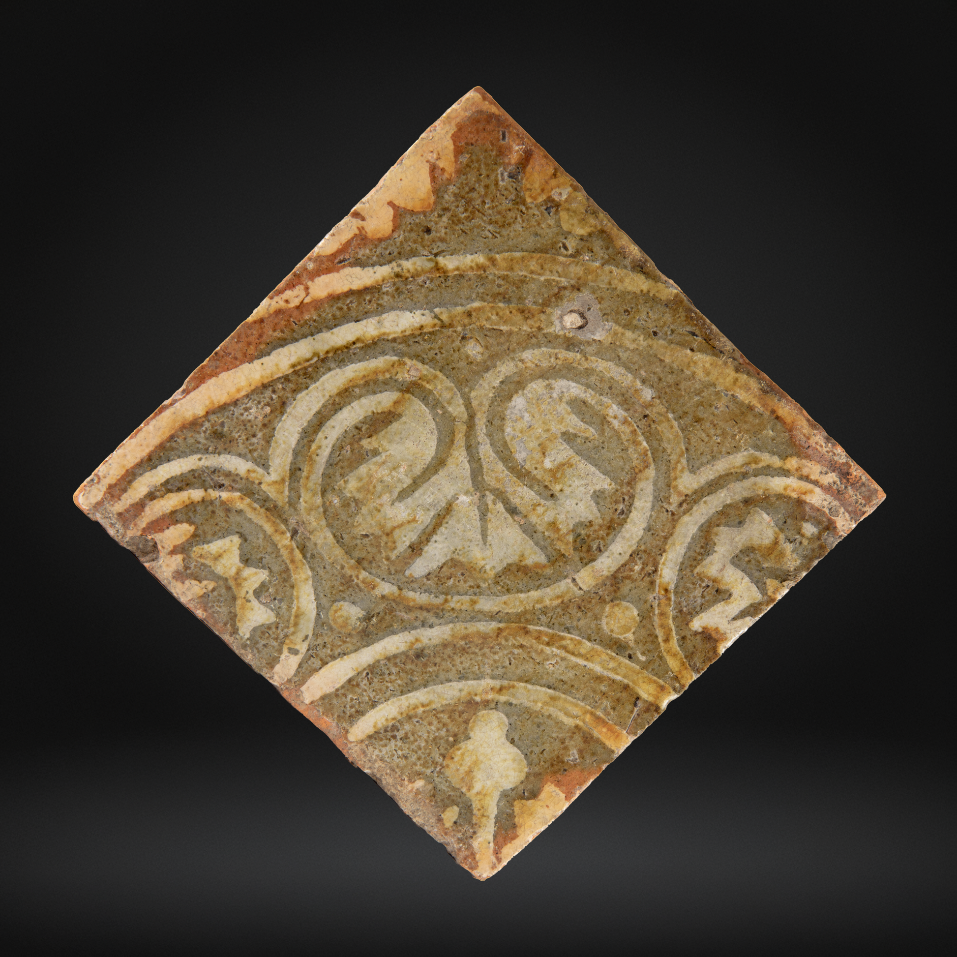 Medieval Encaustic Quatrefoil Floor Tile - 14th Century, Northern France with intricate symmetrical patterns in muted earth tones, showcasing historical medieval encaustic tile craftsmanship.