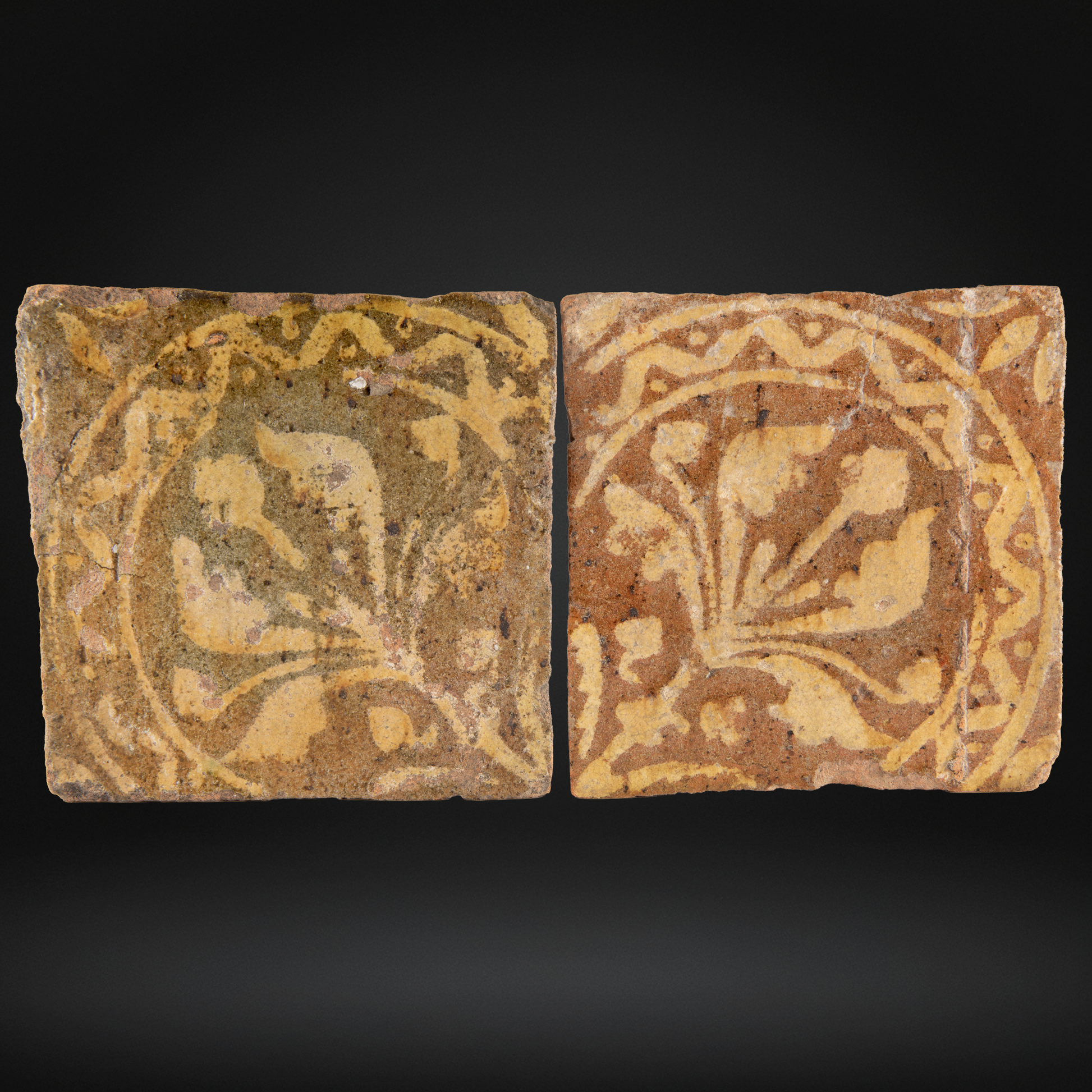 PAIR Medieval Encaustic Quatrefoil Floor Tiles - c14th Century, France, featuring a faded floral quatrefoil pattern in warm earthy tones, showcasing authentic medieval encaustic tile craftsmanship.