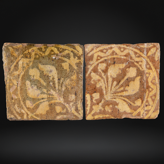 PAIR Medieval Encaustic Quatrefoil Floor Tiles - c14th Century, France, featuring a faded floral quatrefoil pattern in warm earthy tones, showcasing authentic medieval encaustic tile craftsmanship.