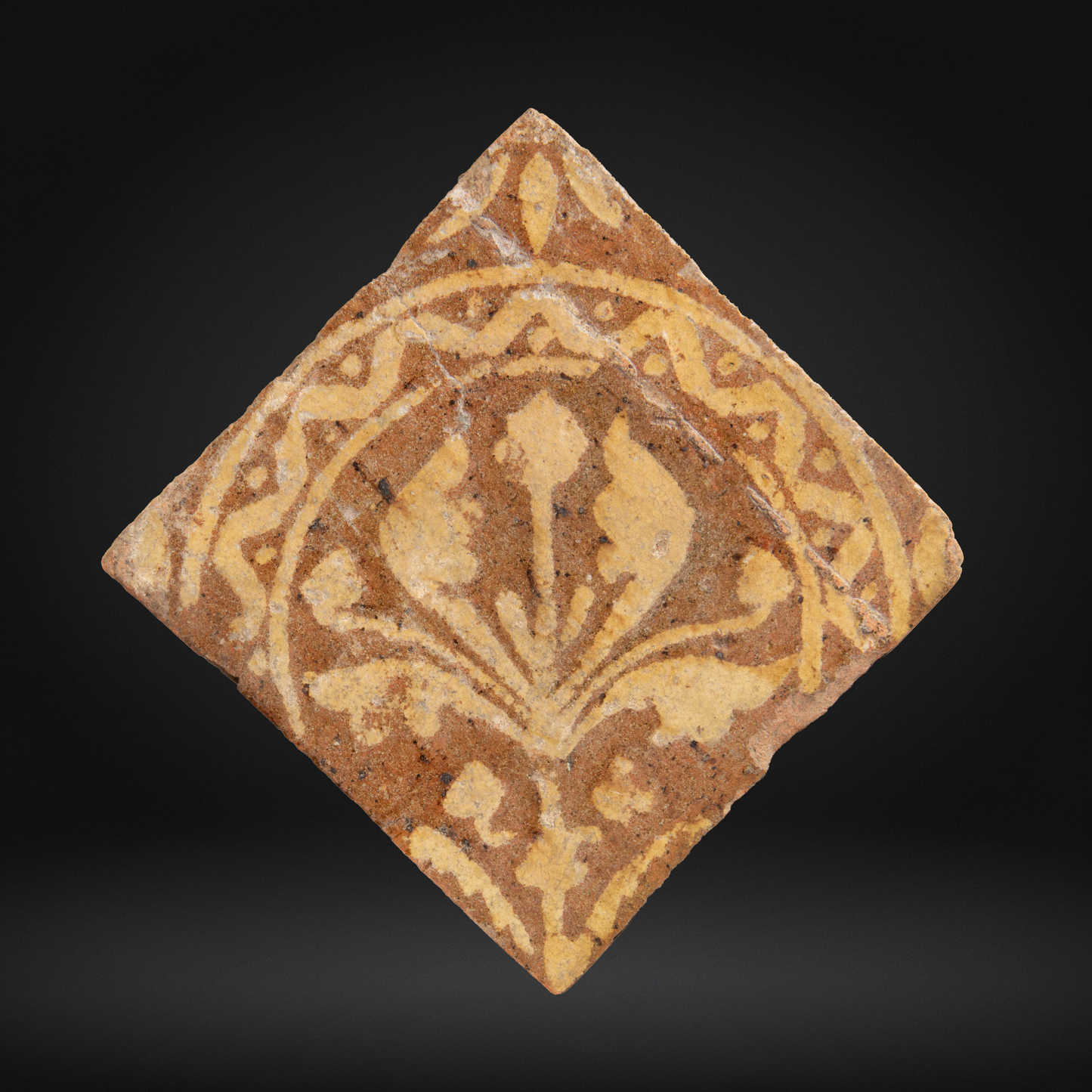 PAIR Medieval Encaustic Quatrefoil Floor Tiles - c14th Century, France featuring a detailed quatrefoil floral pattern in earthy tones, exhibiting medieval encaustic tile craftsmanship.