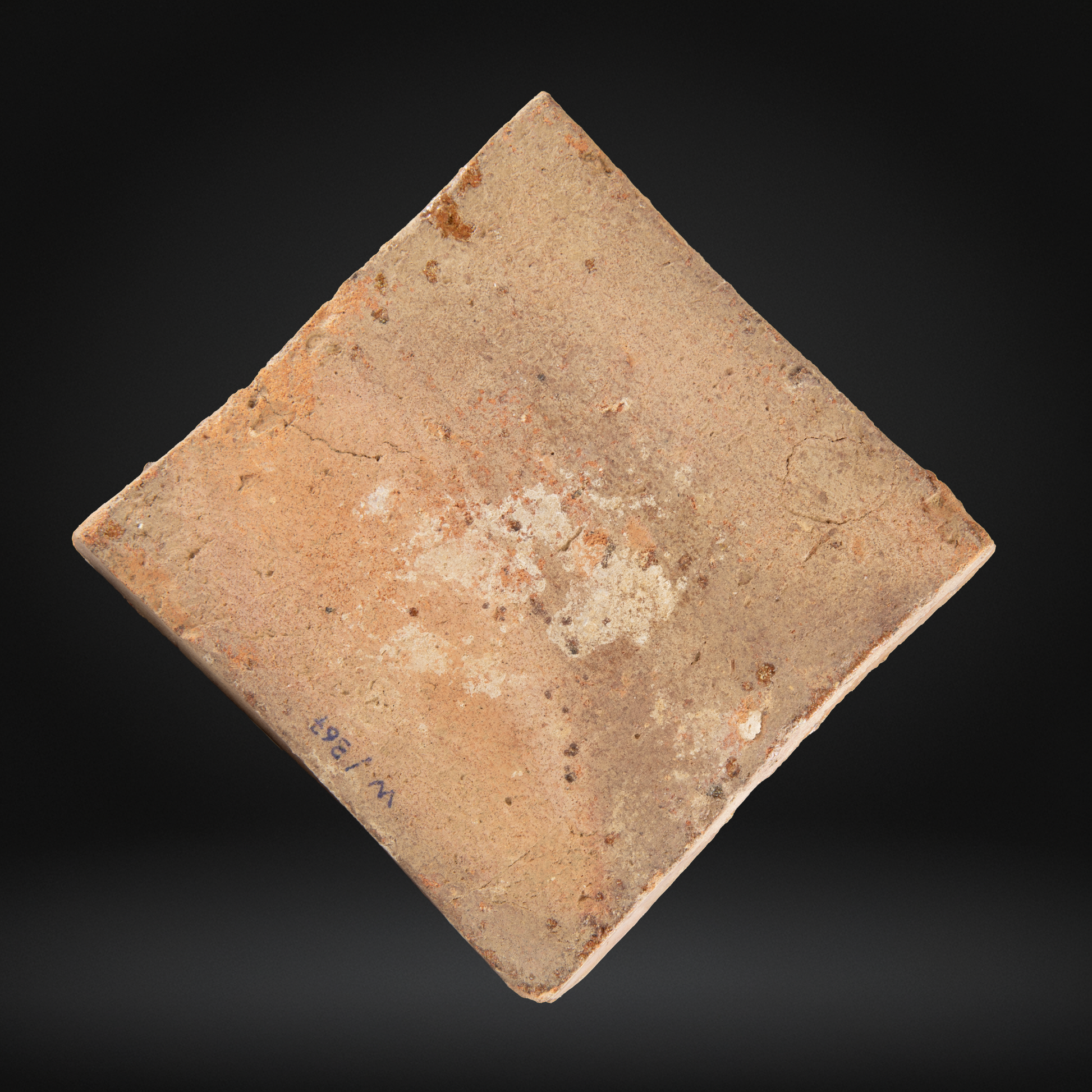Back of a medieval encaustice Abbey floor tile from France.